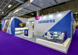 Jazwares exhibition event stand with large format print branding and a purple carpet with large format printing