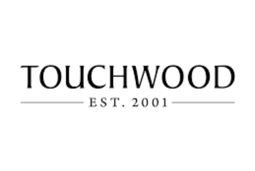 The logo for Touchwood shopping centre, with the name in a black serif font and "EST. 2001" below it.