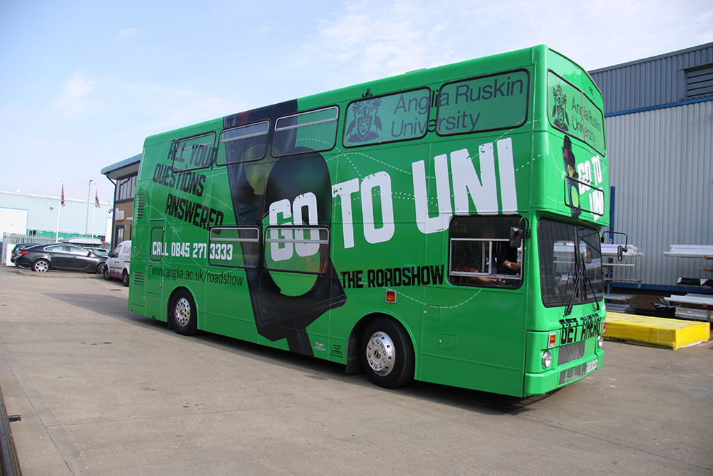 Bright green university promotional bus
